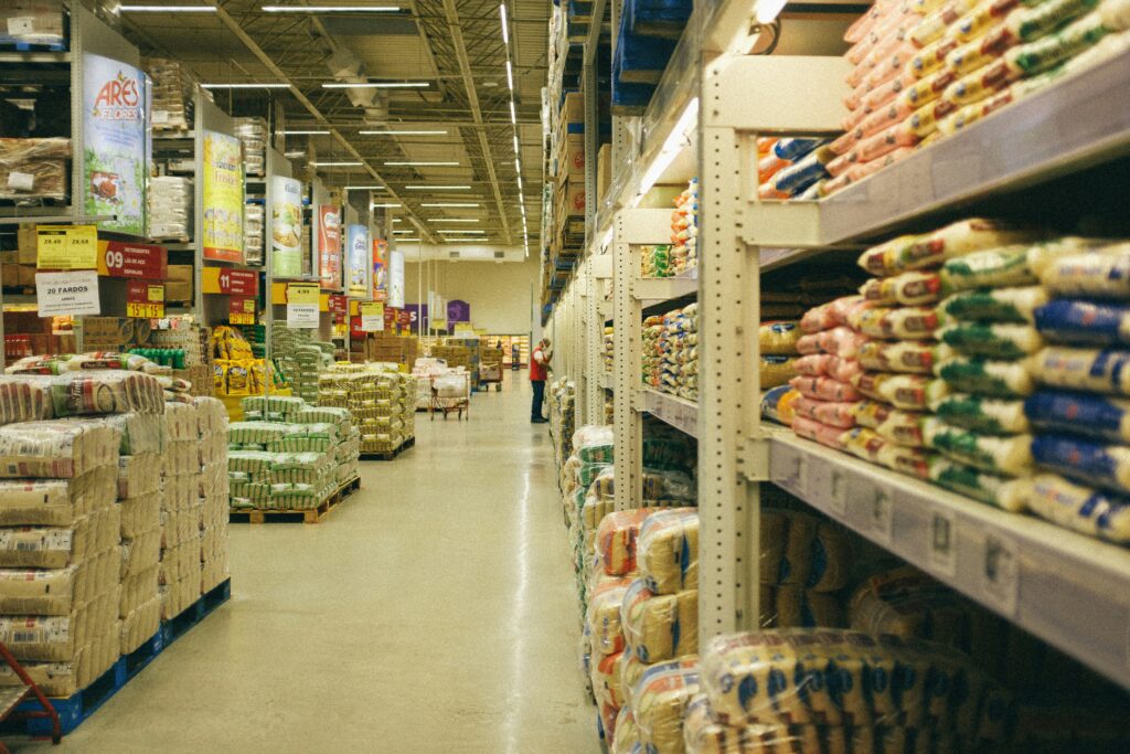 A shopping cart filled with fresh produce, symbolizing the valuable inventory protected by grocery store insurance
