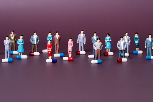A social worker empathetically listening to a client, with a protective shield icon subtly overlaid, representing professional liability insurance for social workers.