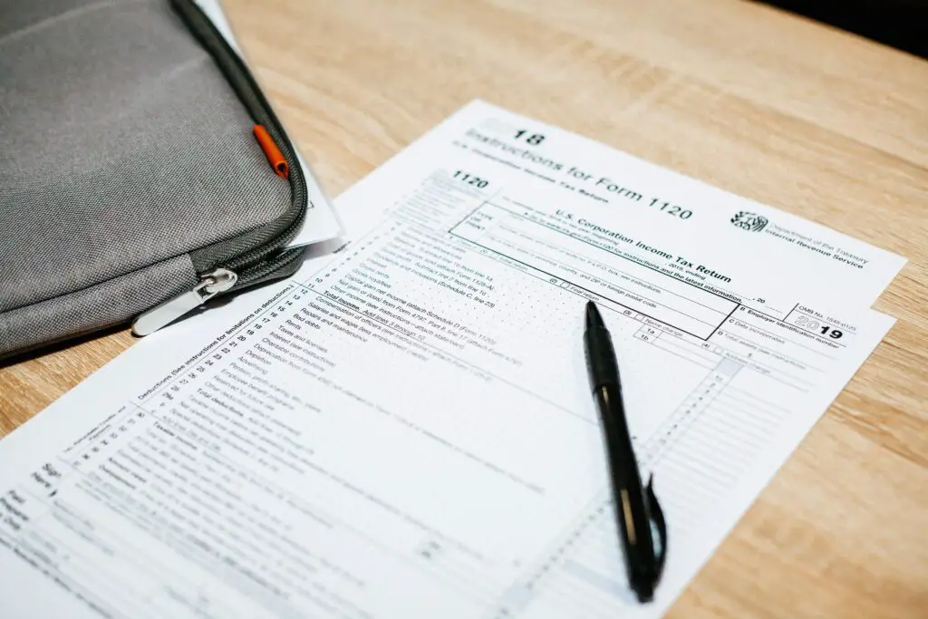 business owner holding workers comp certificate