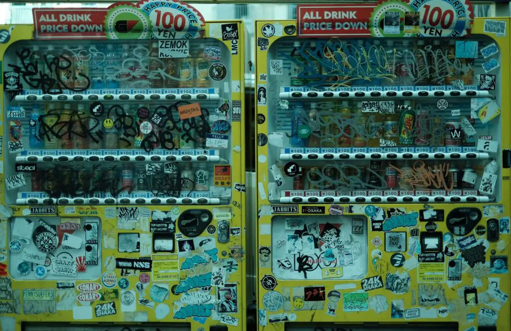vending machine business owner inspecting machine